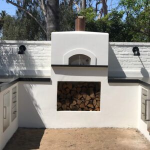 White brick outdoor patio pizza oven. Pizza oven. Brick pizza oven.